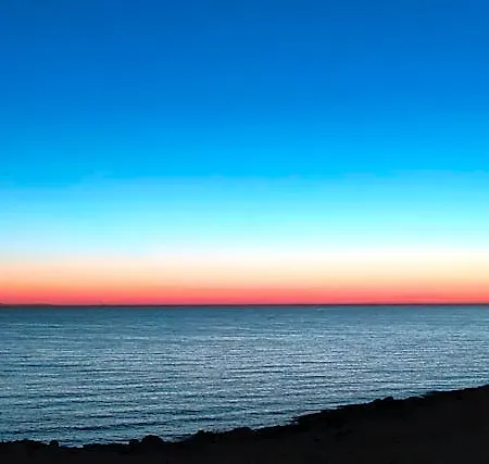 Sunset Bay Torre Suda