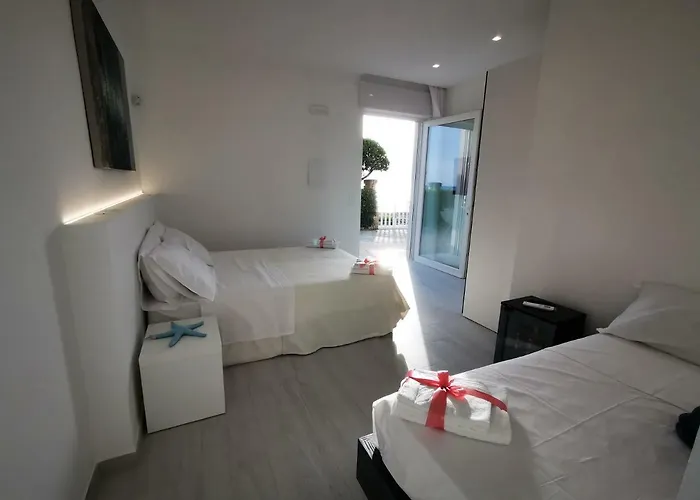 Sunset Bay Torre Suda